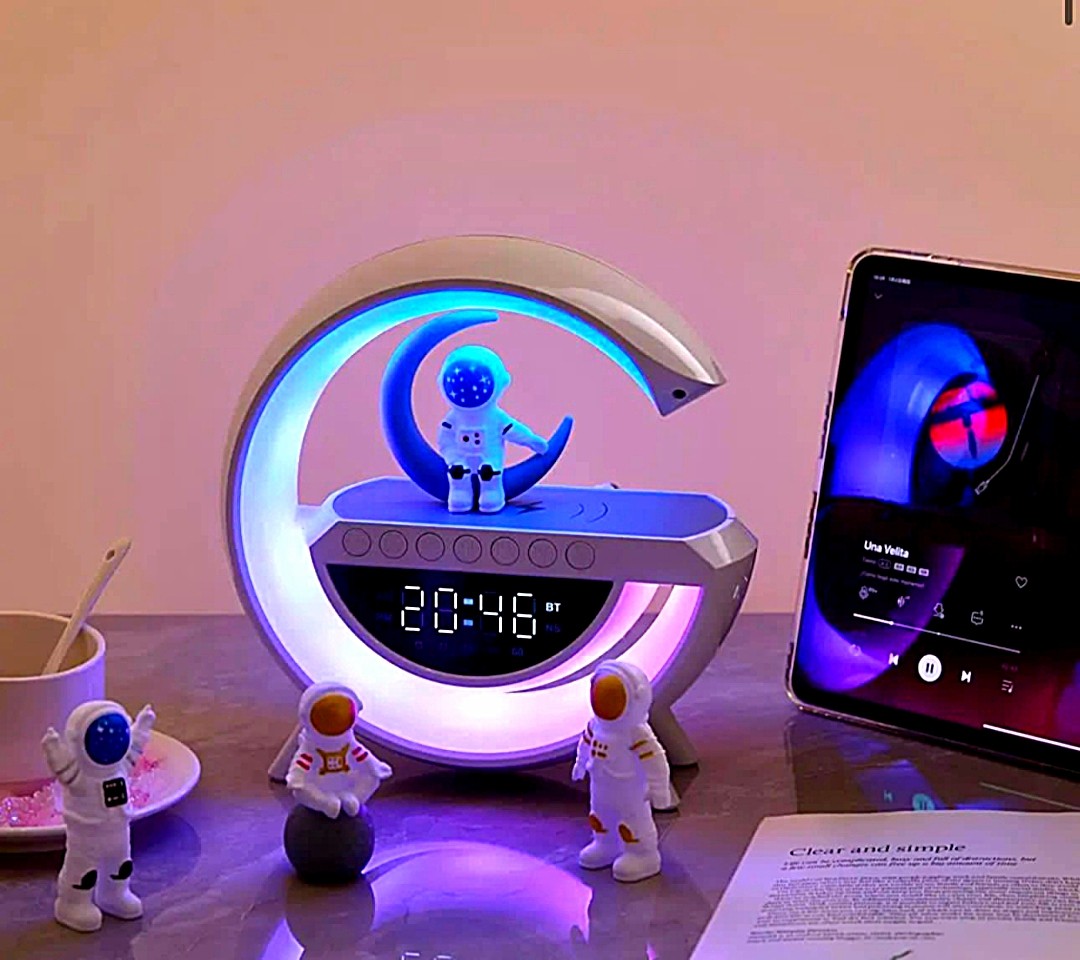Hot-Selling Wireless Bluetooth Audio Multi-Functional High-Color Ambient Night Lamp – Astronaut G-Shape Smart Atmosphere Light with Wireless Charger & Alarm Clock